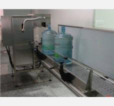 江西市水厂安装桶装水全自动套袋机案例